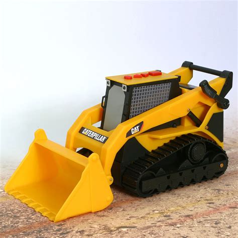 toy state cat skid steer|Toy State CAT Light and Sound Massive Machine Grab Crane .